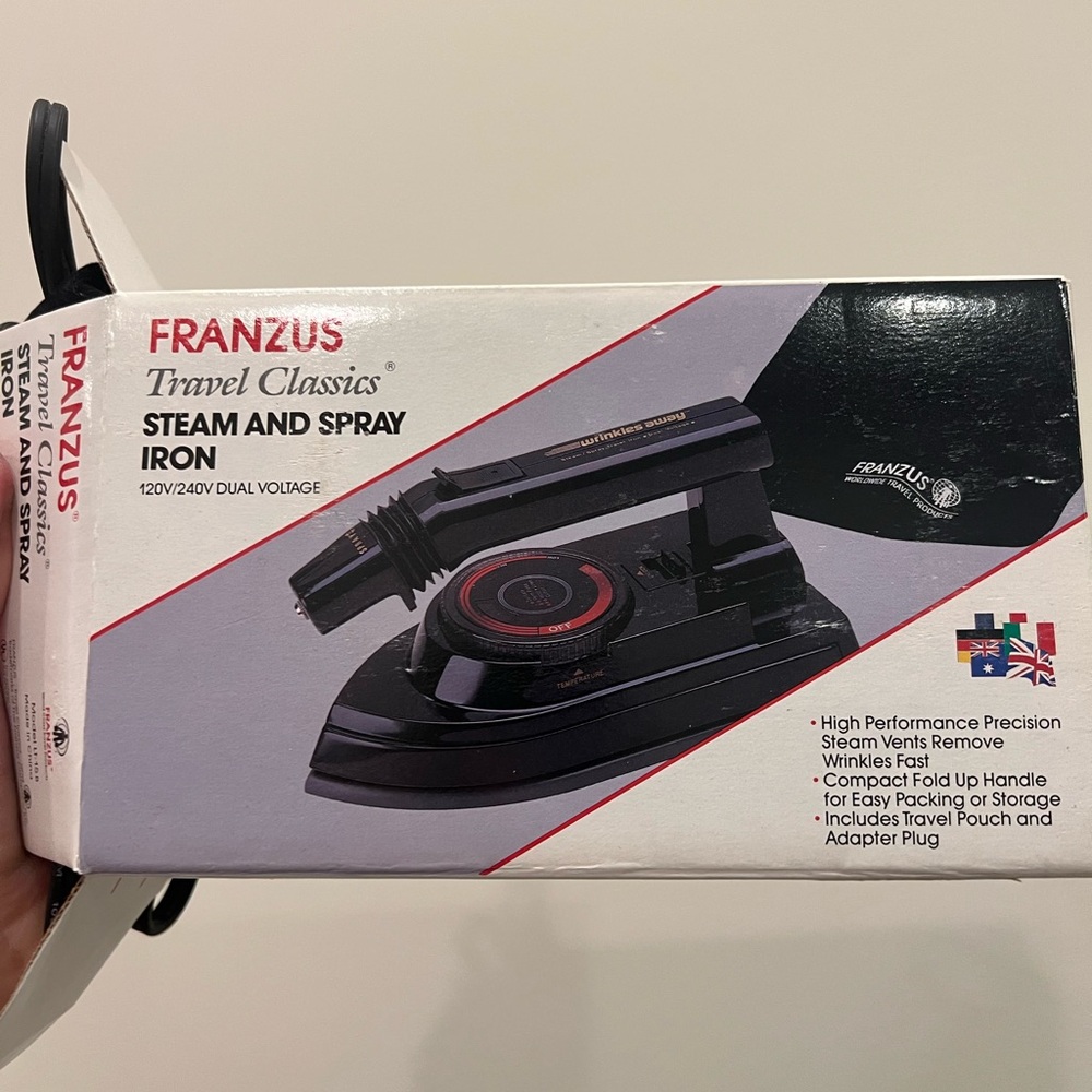 NWT franzus steam and spray travel iron. Works at time of shipping